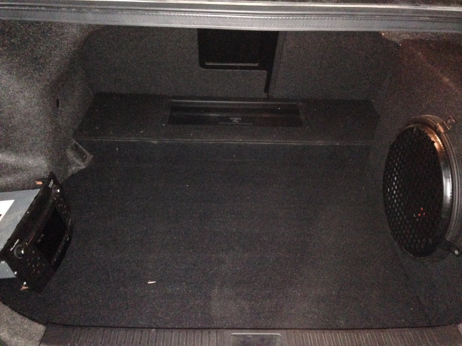 Complete boot area with Amp and Sub Box.<br /><br />See the old head unit in the corner:-(
