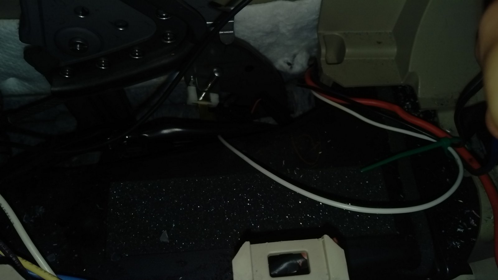 wires come in next to seat to ebrake area.jpg